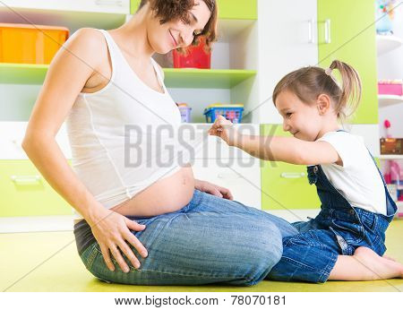 Girl With Pregnant Mother