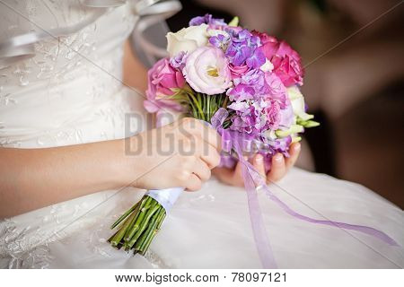 Wedding Bouquet In The Hands Of  Bride