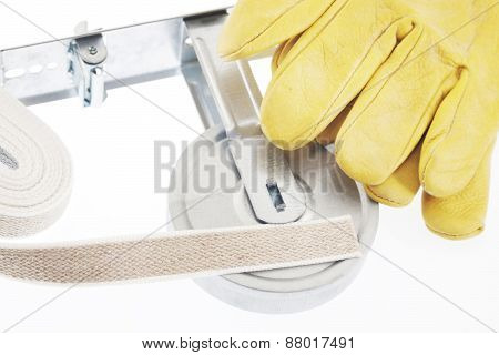 Winder and strap for roller shutter