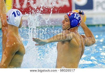BARCELONA - AUG, 1: Paulo Obradovic of Croatia in action against Hungary during a World Championship BCN2013 at the Picornell Swimming pool on August 1 2013 in Barcelona Spain