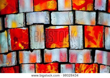 multicolored stained glass with irregular square block pattern