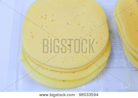 Stack of thin cheese pieces