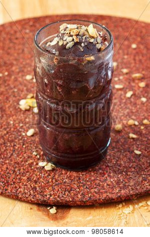 Acai Frozen Pulp Juice In Glass With Muesli