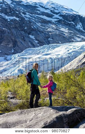 Girls Against The Backdrop Of A Glacier