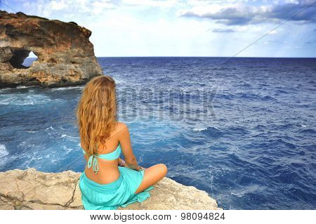 Young Attractive Woman Looking At Sea Horizon Sitting Alone On R