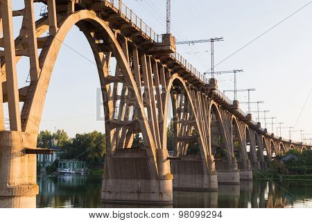 Old Curved  Railway Bridge Over River Dnieper . Dnepropetrovsk.