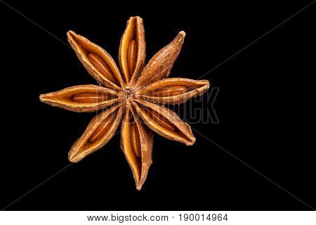 Anise star seeds on the wooden background. Aromatic ingredient in culinary .