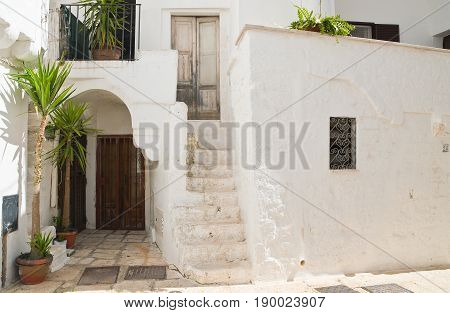 Characteristic alleyway of Cisternino. Puglia. Southern Italy.
