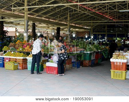 Asian Thai Women And People Travel And Shopping Product And Food From Local Shop At Don Wai Floating