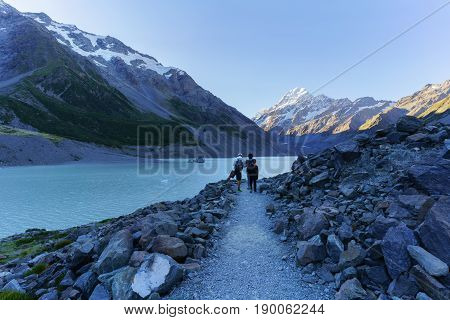 Hooker lake with Icebergs floating on and Aoraki / Mount Cook the destination of Hooker walking track The Aoraki/Mount Cook National Park South Island of New Zealand