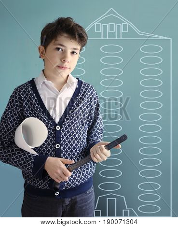 teenager architect student with house draft ruler and pencil close up photo