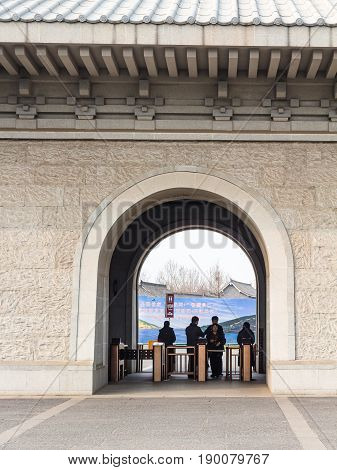 People In Entrance To Area Of Longmen Grottoes