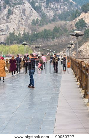 Tourists At Manshui Bridge On Yi River