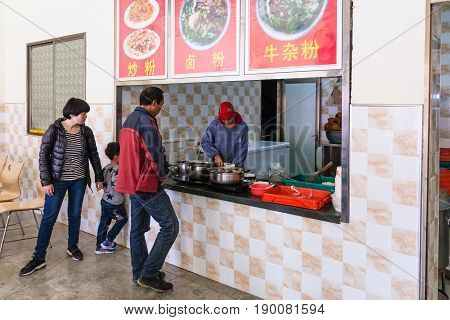 People In Cheap Urban Eatery In Longsheng Town