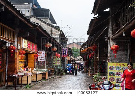 People On Eatery Street In Xingping Town