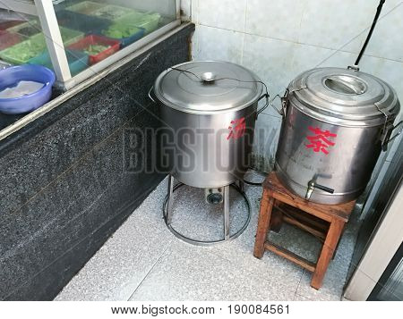 Tanks With Hot Chicken Broth And Boiling Water