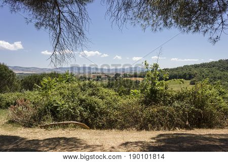 VAL D'ORCIA, ITALY - JUNE 3 2017: Tuscan hills landscape in the region named Val D'Orcia