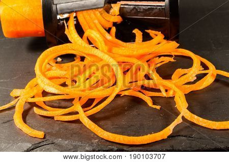 Spiralizer with spiralised Carrot close up or macro..