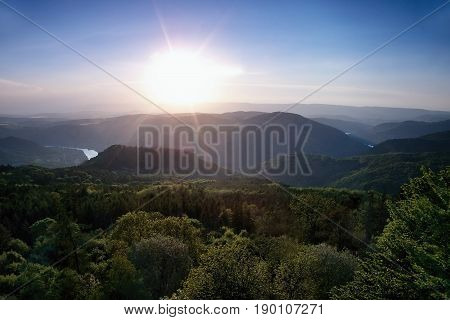 Meander of european river Labe from metal lookout Varhost in spring evening sunset in czech tourist area named Ceske Stredohori