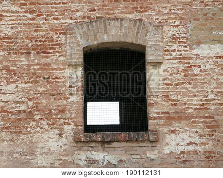 Window of an old brick building in europe