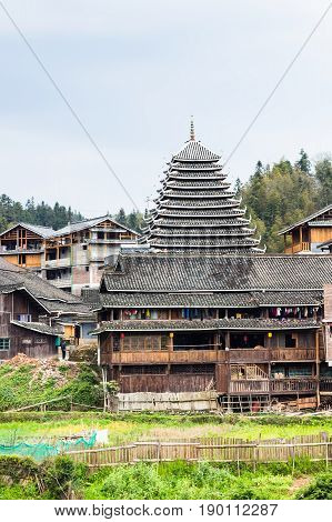 Tower And Wooden Houses In Chengyang Village