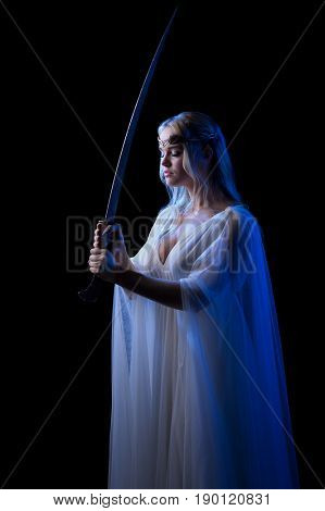 Young elven girl isolated on black
