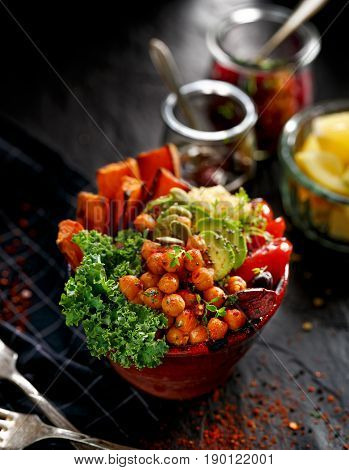 Buddha bowl, the concept of healthy diet, black background, top view