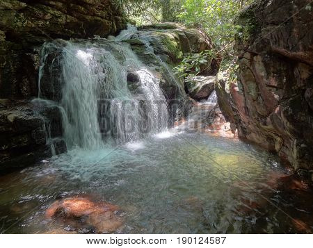 A beautiful waterfall and pool at the sight of the Blue Hole in East Tennessee, USA.