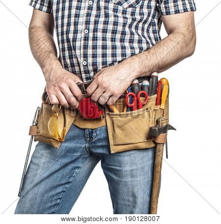 detail of handyman with toolsbelt and tools isolated on white background
