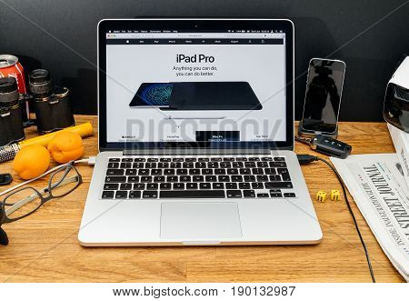 PARIS FRANCE - JUNE 6 2017: Apple Computers website on MacBook Retina in creative environment showcasing latest news from Apple at WWDC 2017 - new iPod Pro showcase with Apple pencil