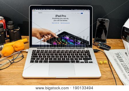 PARIS FRANCE - JUNE 6 2017: Apple Computers website on MacBook Retina in creative environment showcasing latest news from Apple at WWDC 2017 - new iPad Pro with ApplePencil