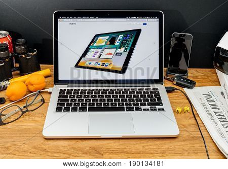 PARIS FRANCE - JUNE 6 2017: Apple Computers website on MacBook Retina in creative environment showcasing latest news from Apple at WWDC 2017 - App Switcher on IOS 11 new iPad Pro