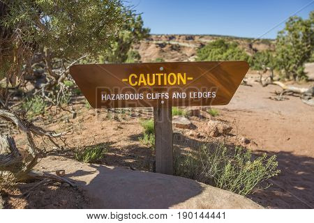 Caution hazardous cliffs and ledges near some arches in Moab Utah