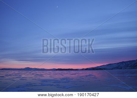 Lake Baika. Cape Uyuga Sunset Winter Landscape