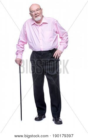 The old man standing with walking stick. Back hurts, radiculitis. Health care for the elderly people.