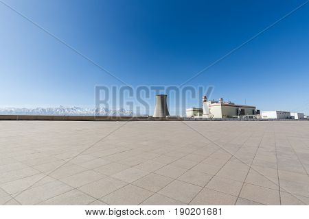 new power plant with empty concrete square floor