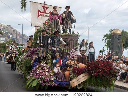 FUNCHAL; PORTUGAL - SEPTEMBER 4; 2016: Group of people in traditional costume; durnig historical and ethnographic; parade of Madeira Wine Festival in Funchal. Madeira; Portugal