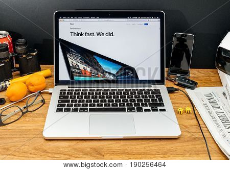 PARIS FRANCE - JUNE 6 2017: Apple Computers website on MacBook Retina in creative environment showcasing latest news from Apple at WWDC 2017 - performance of the new imac
