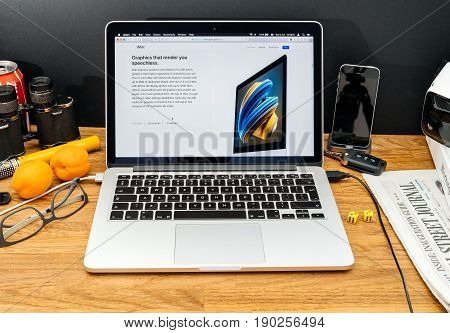 PARIS FRANCE - JUNE 6 2017: Apple Computers website on MacBook Retina in creative environment showcasing latest news from Apple at WWDC 2017 - Radeon Pro 500 in imac new