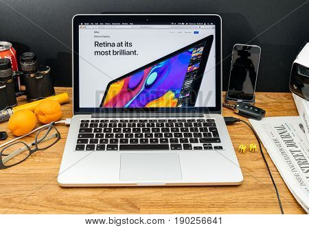 PARIS FRANCE - JUNE 6 2017: Apple Computers website on MacBook Retina in creative environment showcasing latest news from Apple at WWDC 2017 - new Retina display on imac