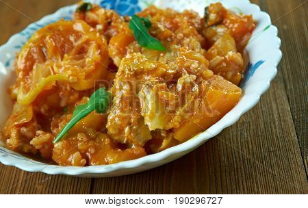 Jamaican Pumpkin Rice Recipe With Saltfish. close up.