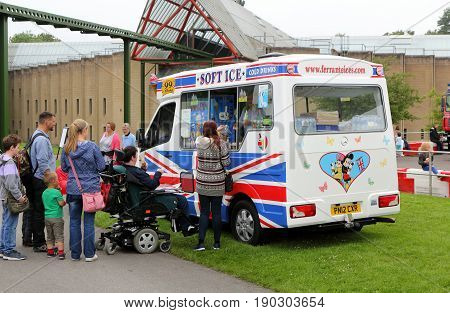 Beaulieu, Hampshire, Uk - May 29 2017: Visitors To The 2017 999 Show Queue For Ice Cream From A Van