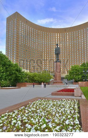 MOSCOW JUN 8 2017: View of famous international Hotel Cosmos curved building USSR Russia architecture and famous french president Charles De Gaulle monument sculpture. World famous hotels