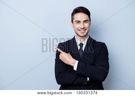 Close Up Portrait Of Young Successful Brunete  Stock-market Broker Guy On The Pure Light Blue Backgr
