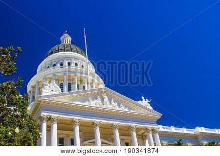 Statues, Dome And Turret On Capitol Building