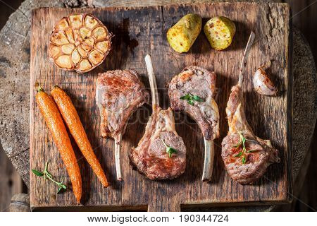Hot Roasted Lamb Ribs On Old Woden Plank