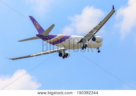 Bangkok, Thailand. - April 23, 2017 : Plane of Thai Airways in the sky landing to Suvanabhumi airport.