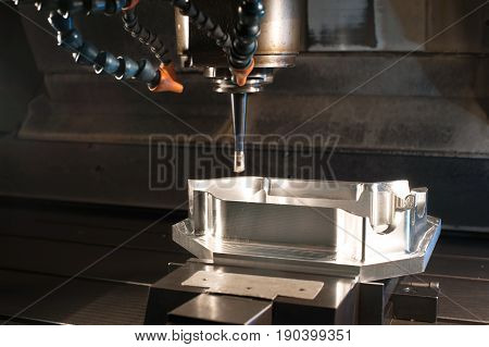 Industrial metal mold/ blank milling. Metalworking and mechanical engineering. CNC technology. Side view.