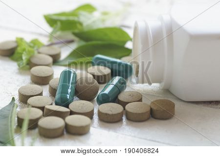 pill herbal on top view of wood table and copy space