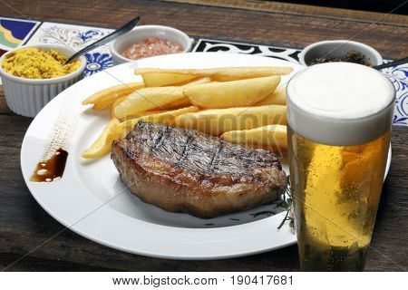 Picanha Steak with fries and beer